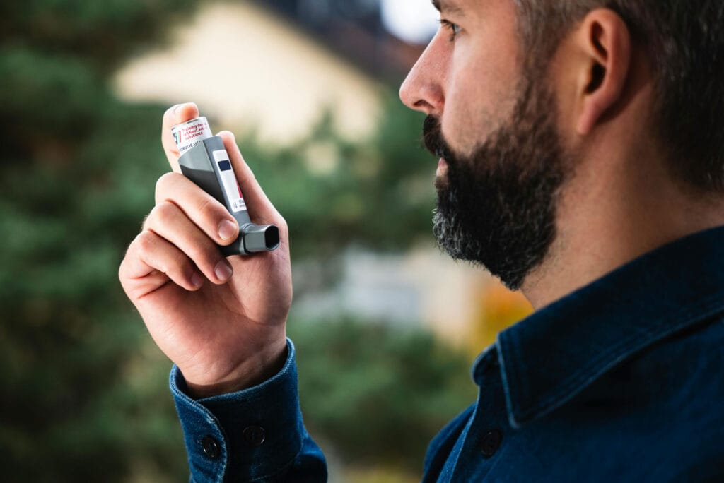 Asthma inhaler, representing respiratory health