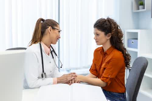 Doctor discussing cervical cancer screening with a patient
