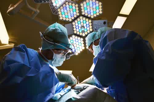 Doctor discussing prostate and testicular cancer screening with a patient